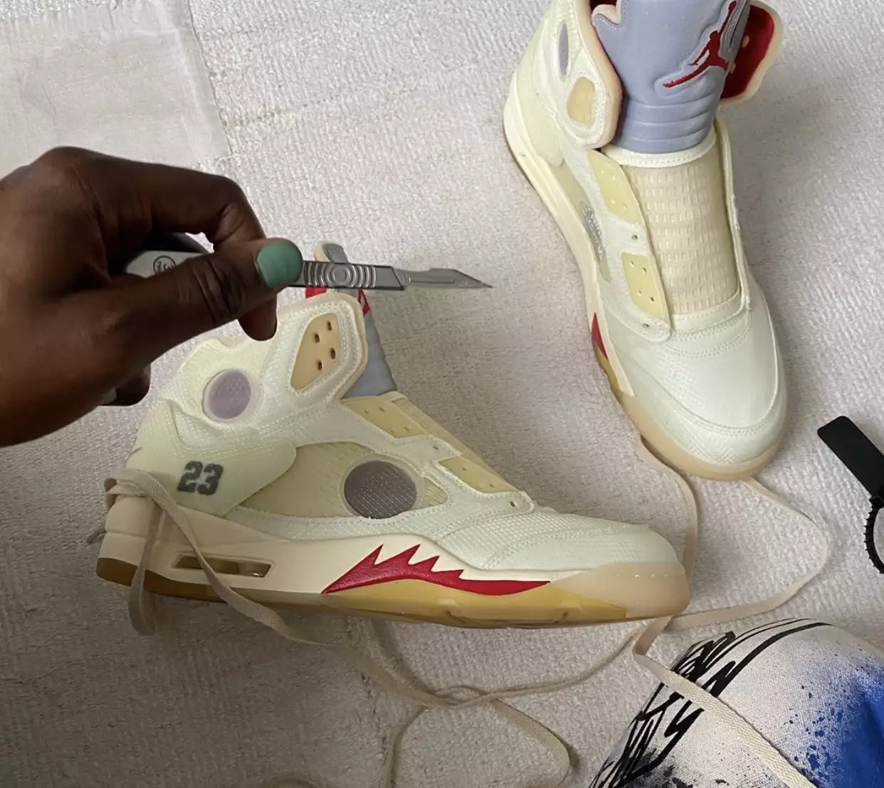 Off-White Air Jordan 5 شراع أحمر فضي CT8480-100 تاريخ الإصدار