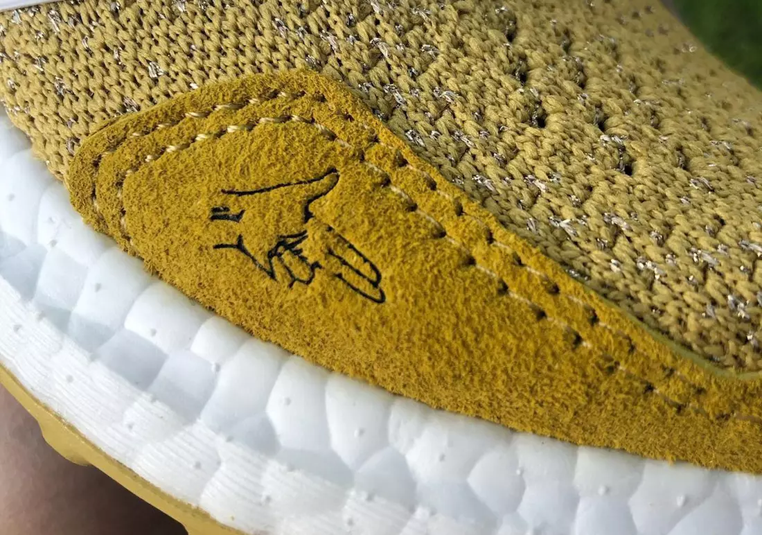 Extra Butter Happy Gilmore من adidas Ultra Boost Gold Jacket تاريخ الإصدار