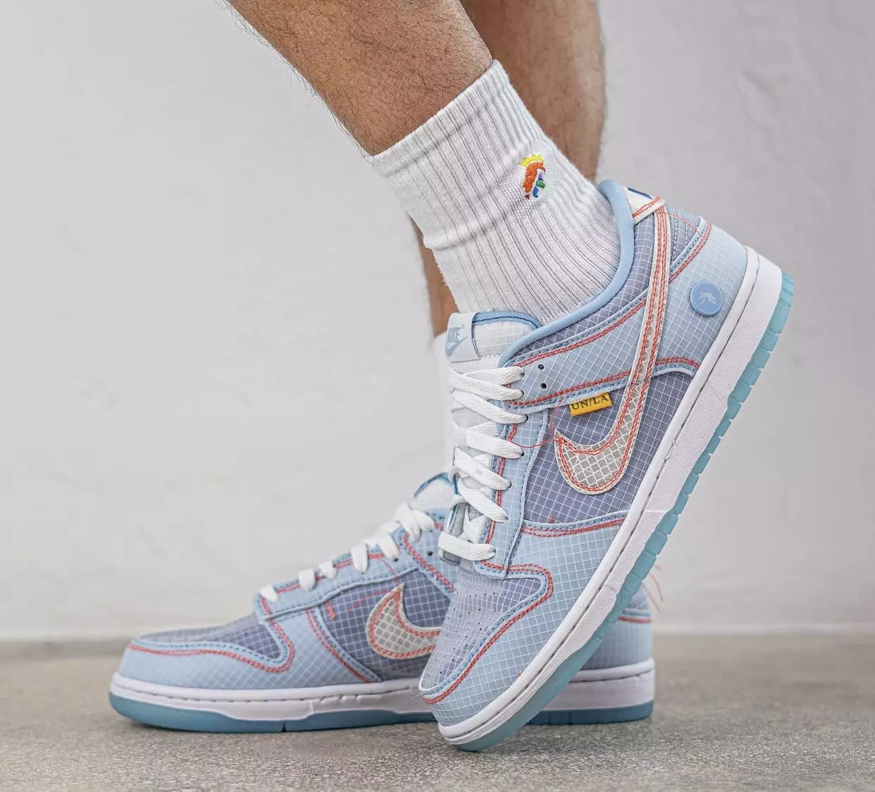 Union Nike Dunk Low DJ9649-400 Megjelenés dátuma lábon