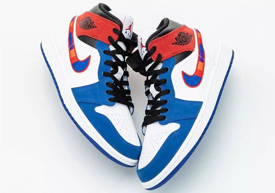 Tento Air Jordan 1 Mid uvoľňujúci s viacfarebnými vyšívanými vlnovkami