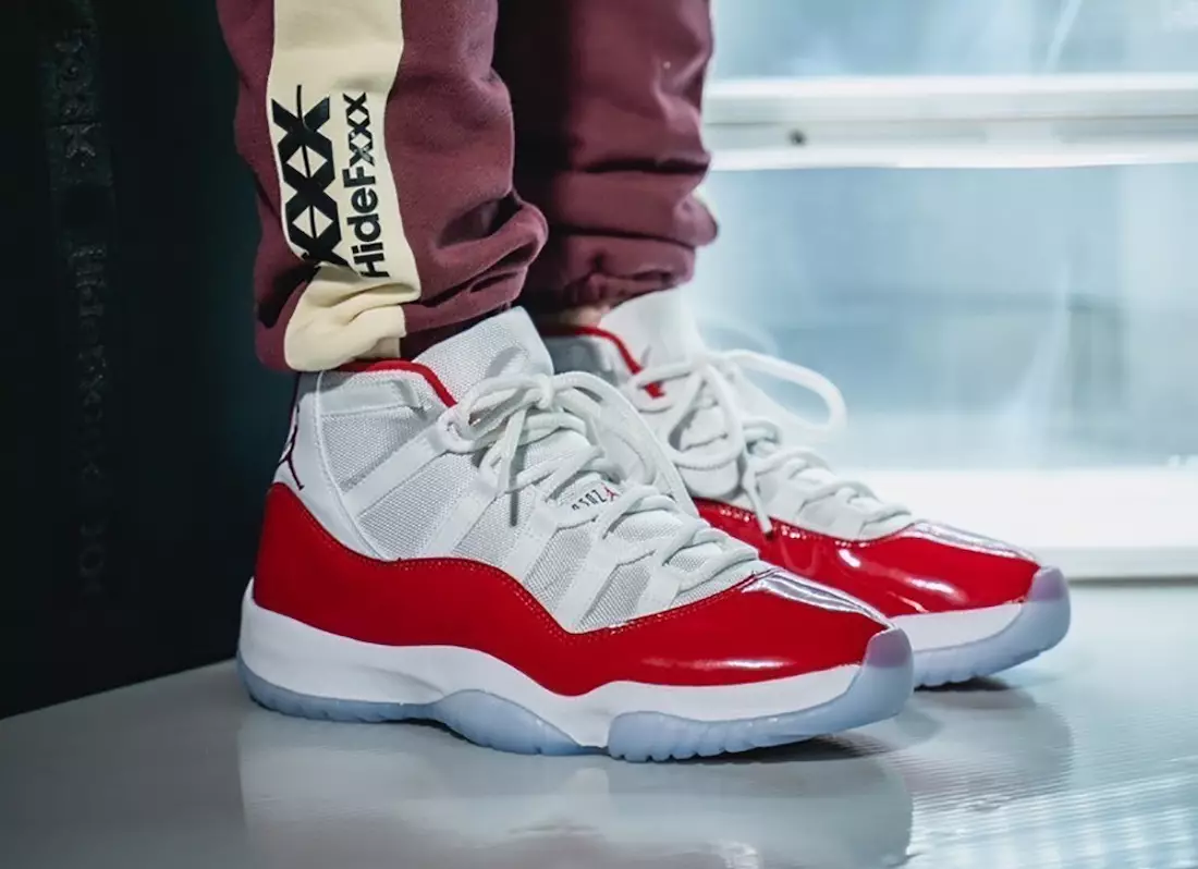 Air Jordan 11 Cherry Varsity Red CT8012-116 op voeten