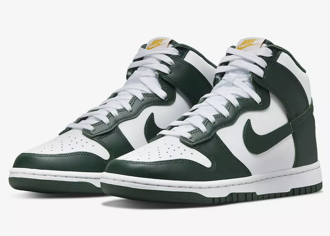 Nike Dunk High paljastuu valkoisena ja vihreänä kultaisilla aksenteilla