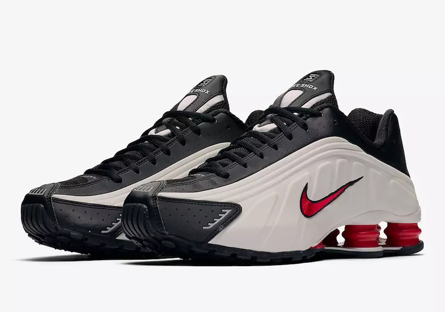 Nike combineert platinatint en universiteitsrood met de Shox R4