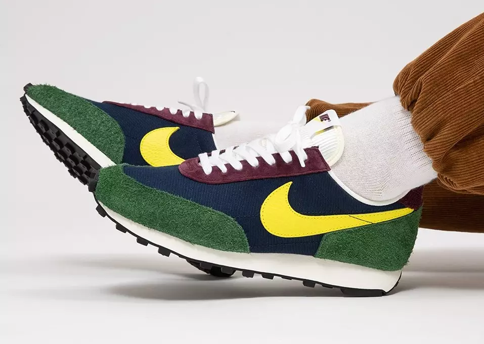 Een Nike Daybreak met herfstthema en opvallende gele swooshes