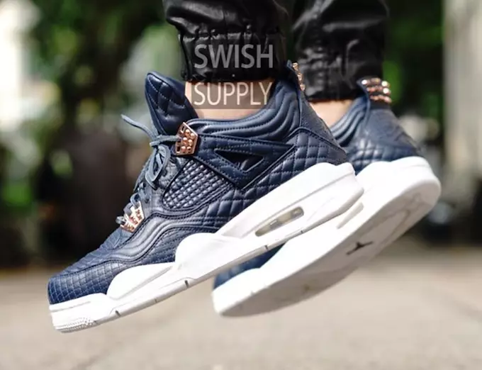 Air Jordan 4 Premium Obsidian lammeskind på fødderne