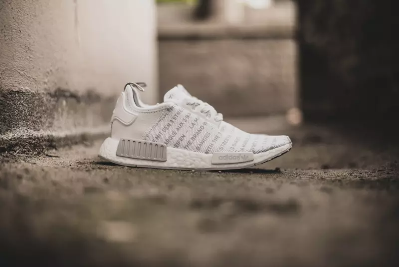 Marca adidas NMD con las tres rayas Blackout Whiteout