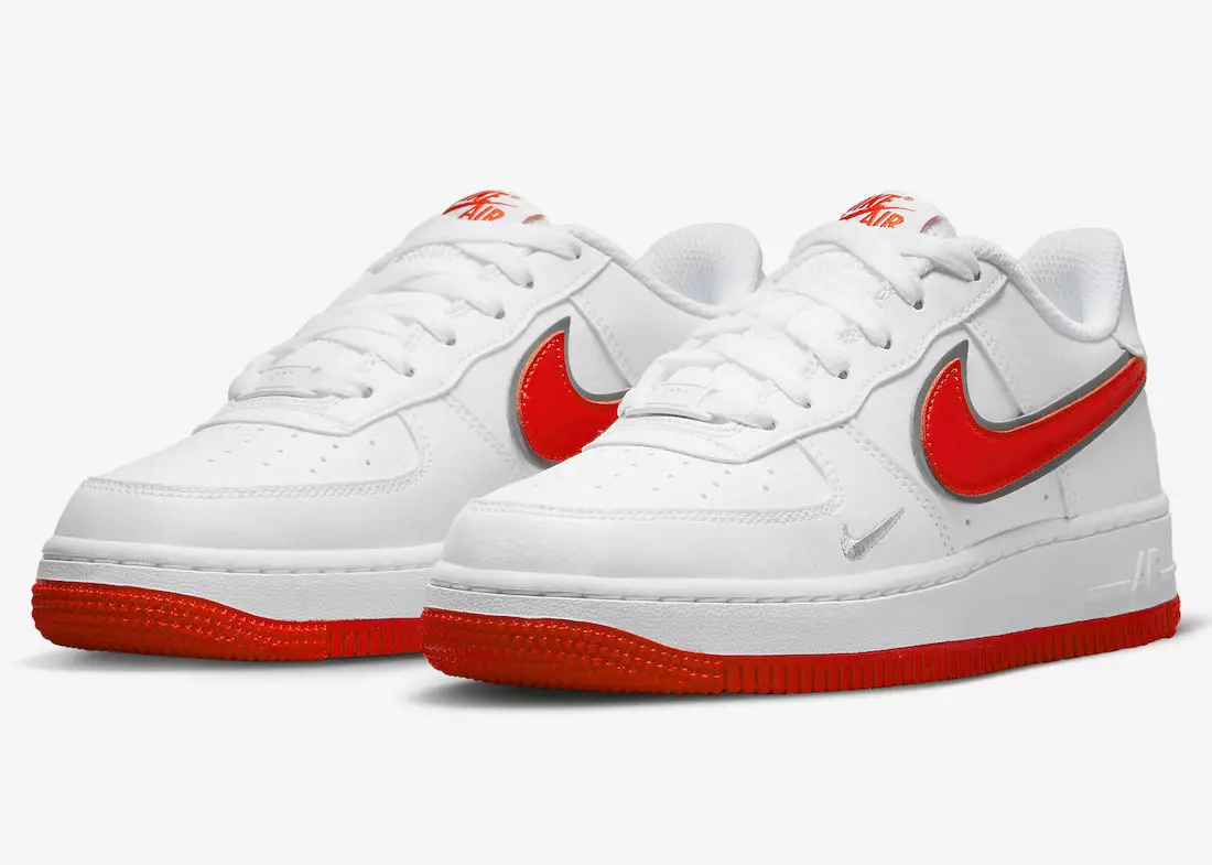 Denna Nike Air Force 1 Low lyser upp med orange höjdpunkter