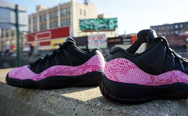 Roze slangenleer bedekt deze Air Jordan 11 Low