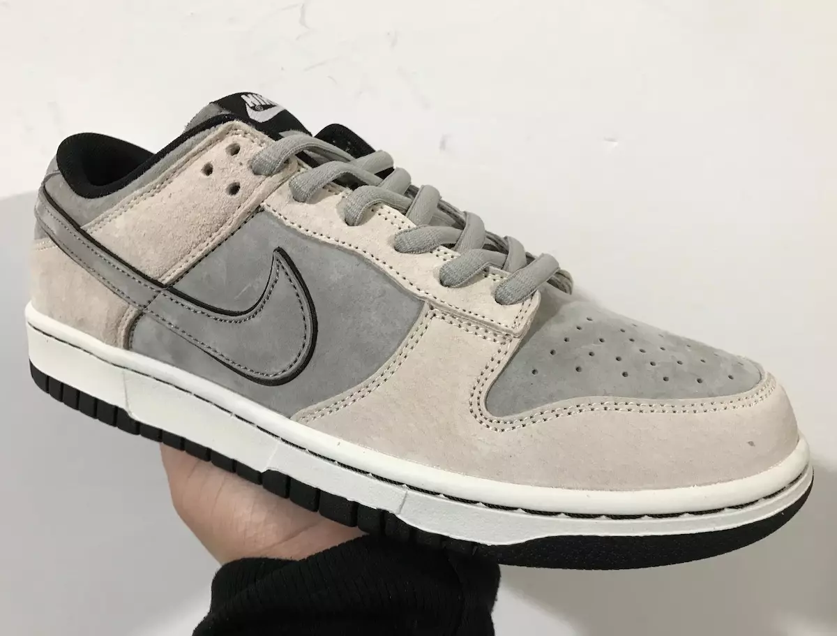 그레이 스웨이드 소재의 새로운 Nike Dunk Low Surfaces