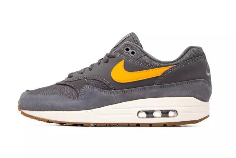 Nike Air Max 1 in Donnergrau mit orangefarbenem Swoosh