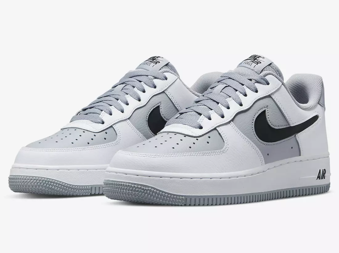 Nike Air Force 1 бо рангҳои хокистарӣ/сафед бо фуҷуҳои буридашуда мебарояд