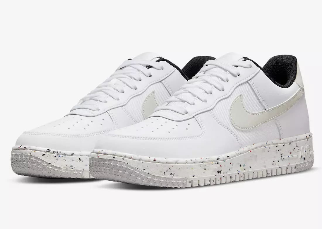 Մաքուր սպիտակ Nike Air Force 1 ցածր խառնարան ճանապարհին