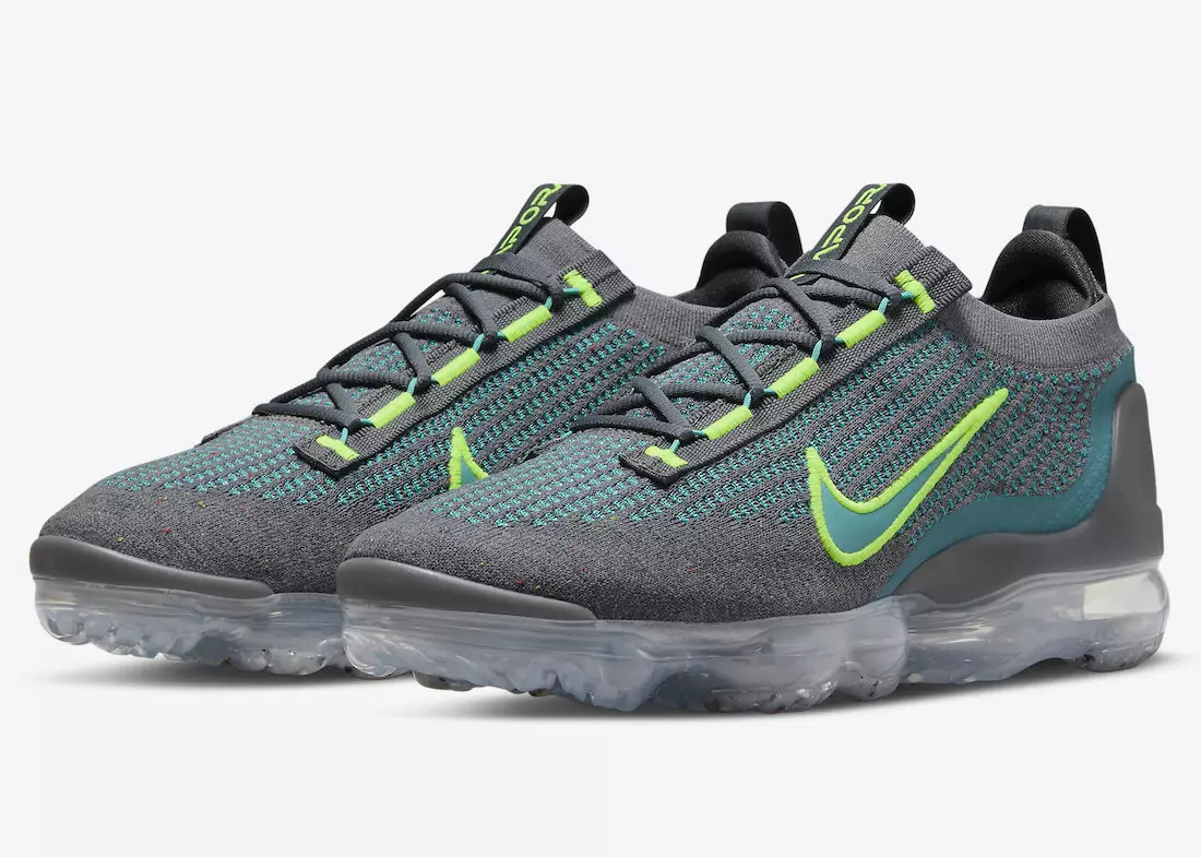 Un Nike Air VaporMax 2021 gris ressaltat en verd verd i volts