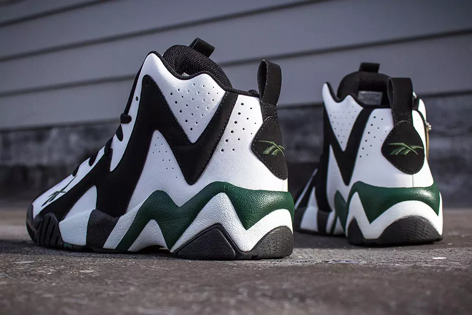 Классические кроссовки Reebok Kamikaze II Mid OG Шона Кемпа вернутся в продажу в ноябре 2015 года в сочетании черно-бело-зелено-красного цвета.