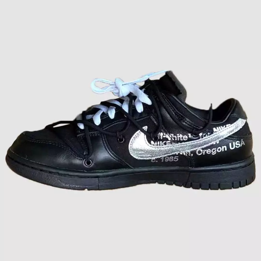 אויסגעלאשן-ווייַס Nike Dunk Low די 50 זאַמלונג מעלדונג טאָג